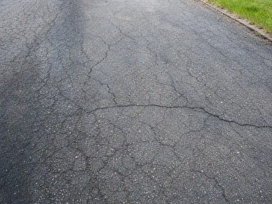 Sealcoat vs Resurface vs Replace: The Driveway Decision Rule